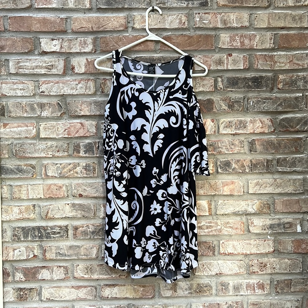 Black and white cold shoulder tunic.